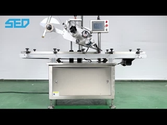 Machine automatique d'étiquetage des surfaces plates