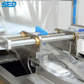 Machine d'emballage de type oreiller à flux pour brosse à dents d'hôtel